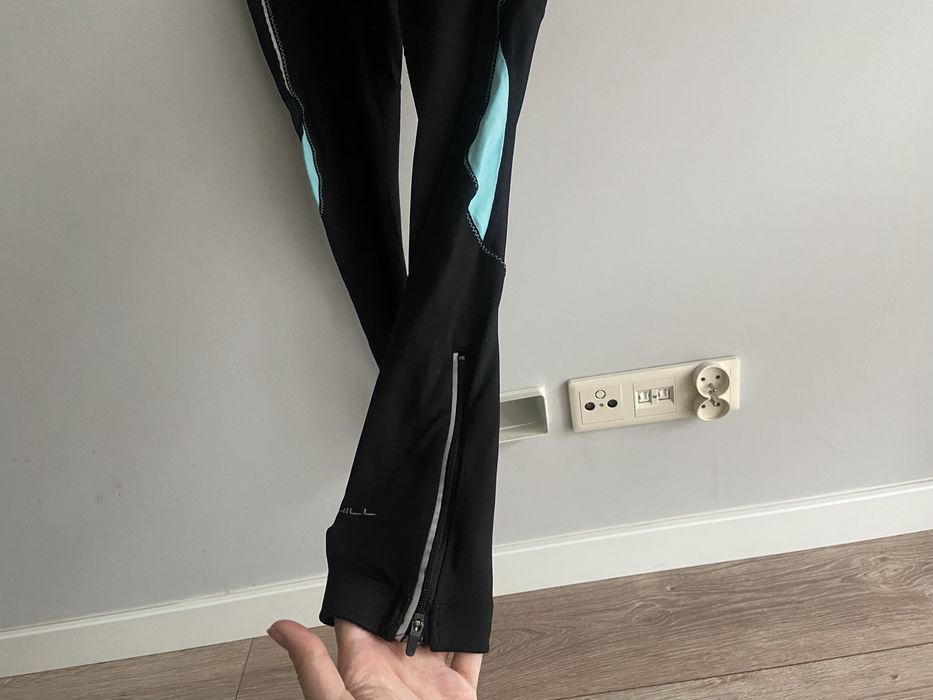 Ronhill sportowe legginsy z odblaskami kieszonka r 36