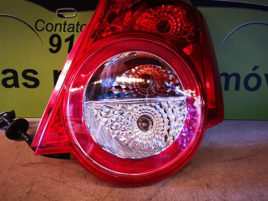CHEVROLET AVEO FAROLIM DIREITO - FT174