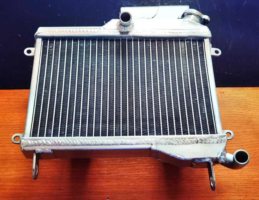 Radiador Yamaha TZR250 1KT 2MA 2XW desde o ano de 1987 ao ano de 1989.