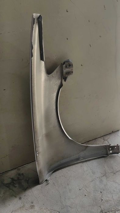 Guarda lamas esquerdo Volvo V50/S40