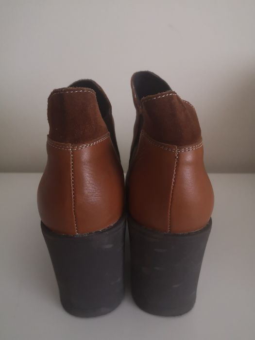 Botas de inverno em pele