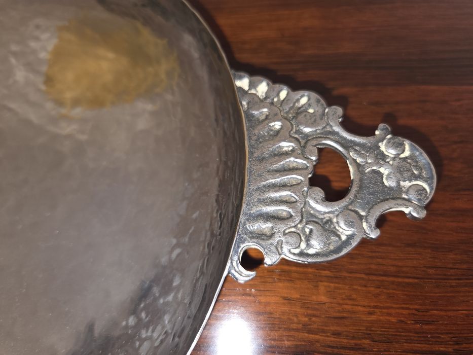 Despeja bolsos em metal