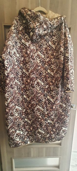 Płaszcz firmy Minouu