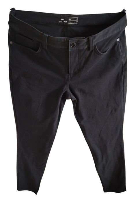 Markowe elastyczne spodnie jeans firmy Nike r 38 M czarne