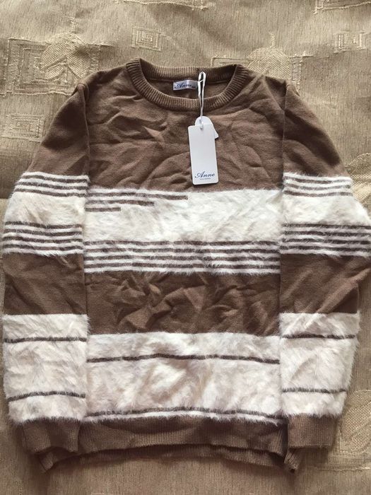 Светри жіночі л розмір