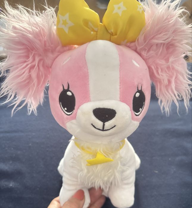 Pink plush female dog with batteries