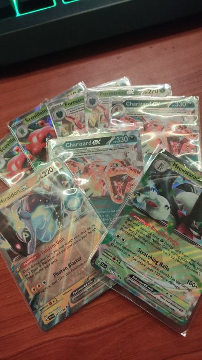 400÷ cartas originais de Pokémon