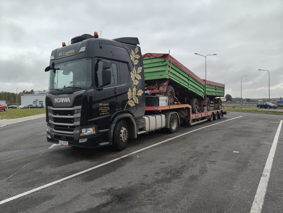 Transport maszyn ciągników holowanie pomoc drogowa  laweta