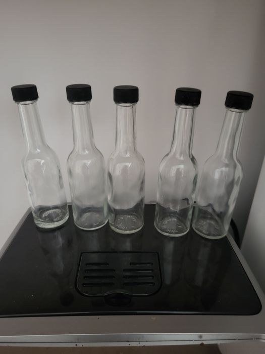 Buteleczki szklane z nakrętką 100 ml.