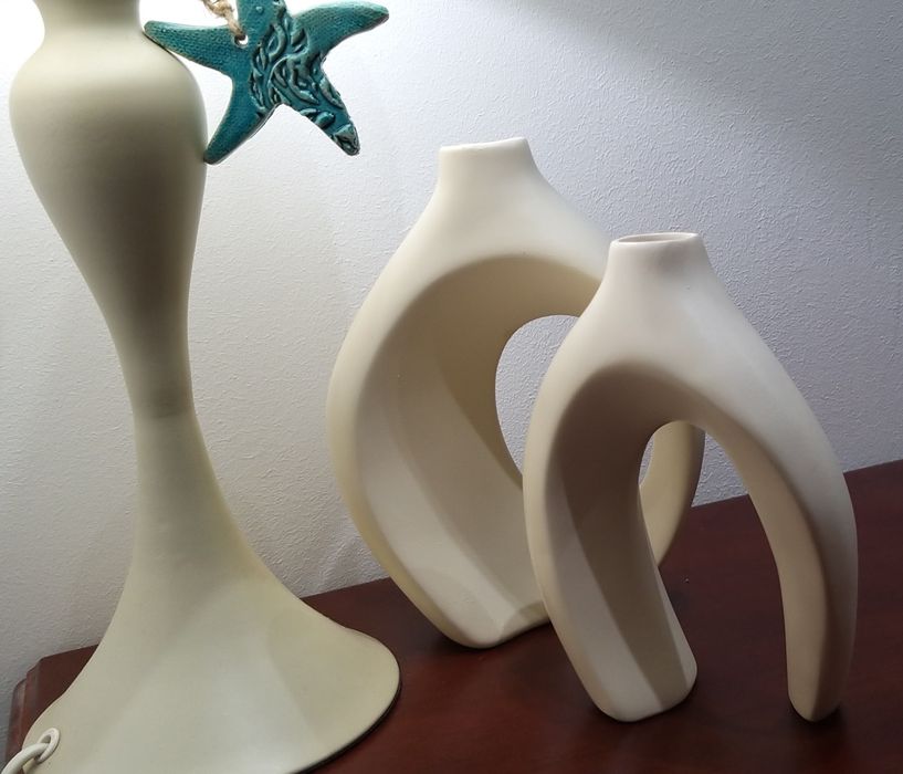 Par de solitários em cerâmica.