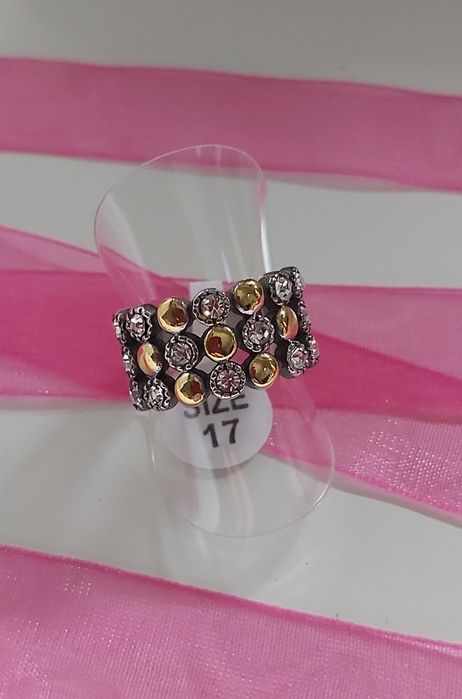 Anel bicolor, em aço, com zirconias. T17