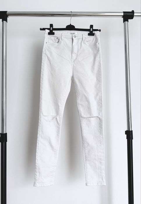Białe damskie spodnie jeansowe z dziurami skinny rurki S 36 Goodies
