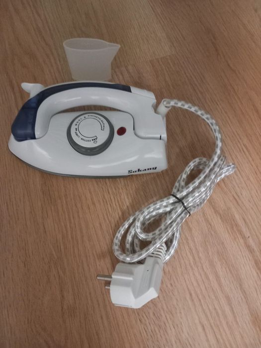 Ferro de engomar portátil