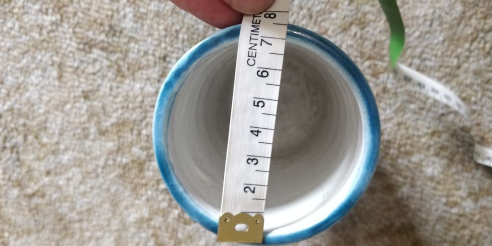 Blue-toned ceramic jug427809196946892802