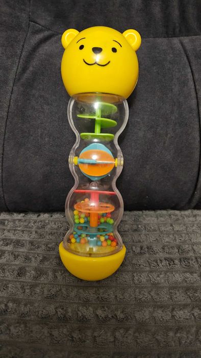 Ciekawa grzechotka miś