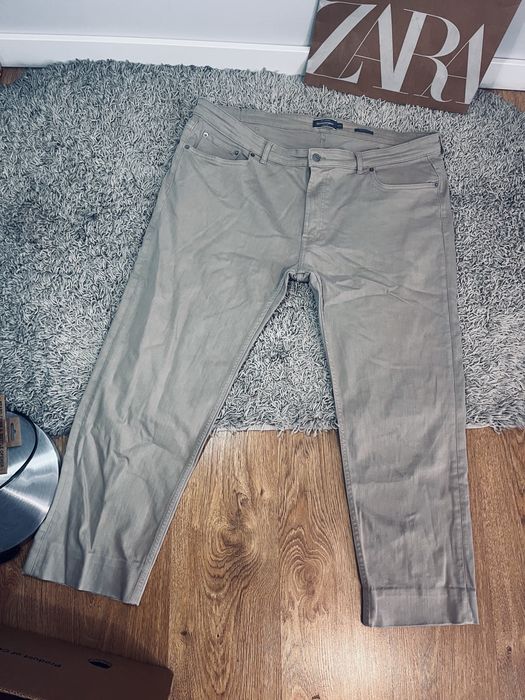 Meskie spodnie jeansy bezowe Dressmann rozm 42/43