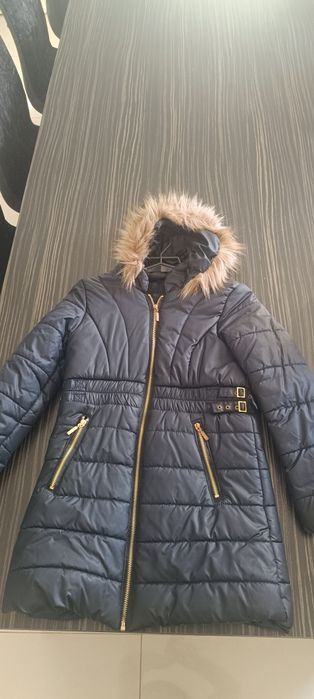 Kurtka dziecięca z wadą, przypalona.