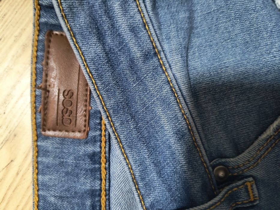 Jeansy męskie ASOS z dziurami W32 L30