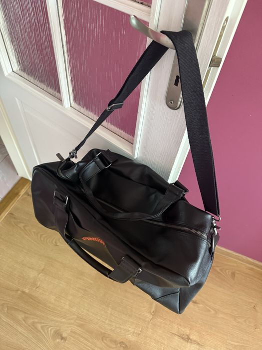 Torba skorzana z logo HBO/Pingwin