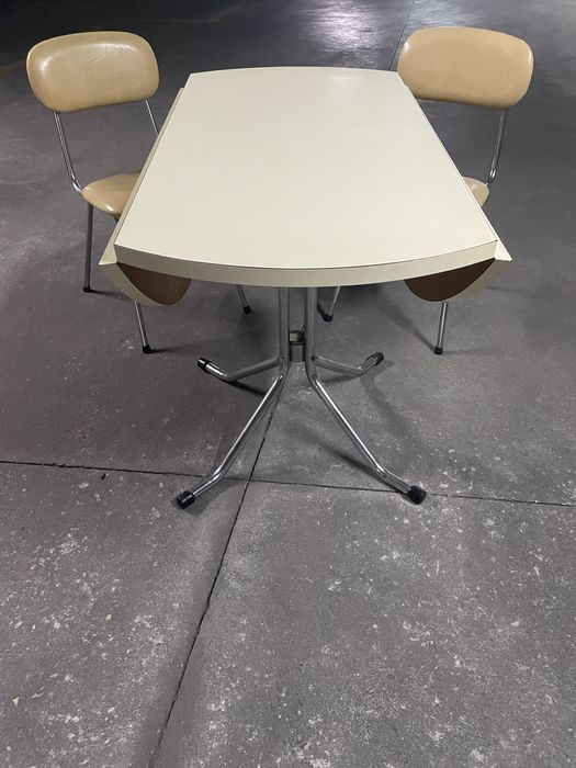 Round Table + 2 Complimentary Chairs64738540847489122