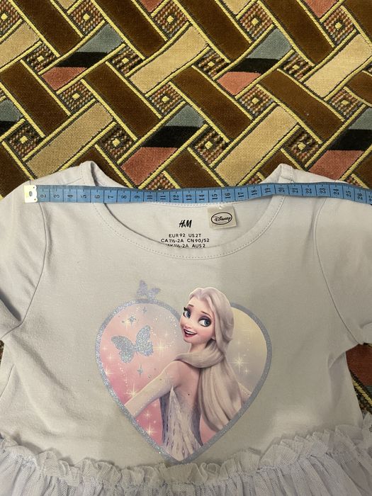 Ніжна блакитна сукня з коротким рукавом на дівчинку