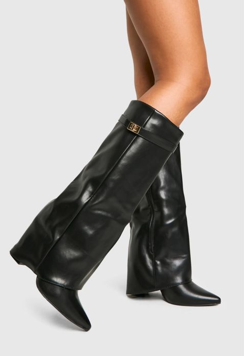 Трендові високі чоботи