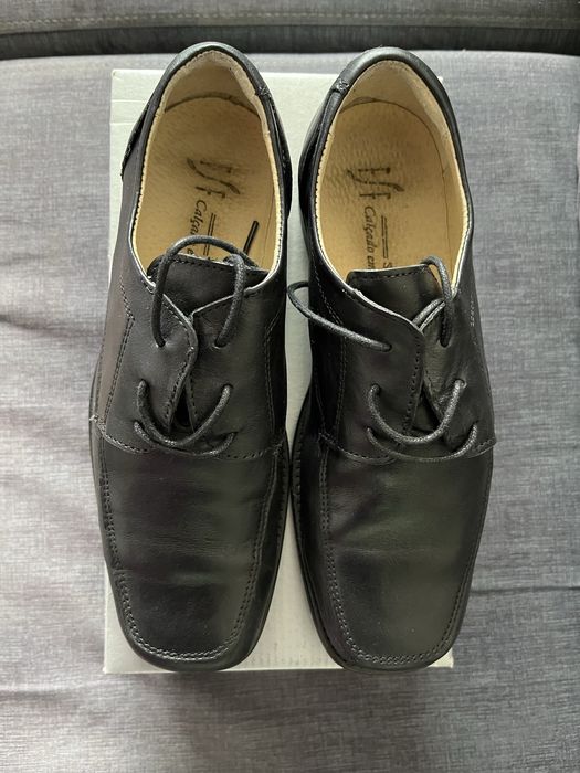 Sapato de sola preto