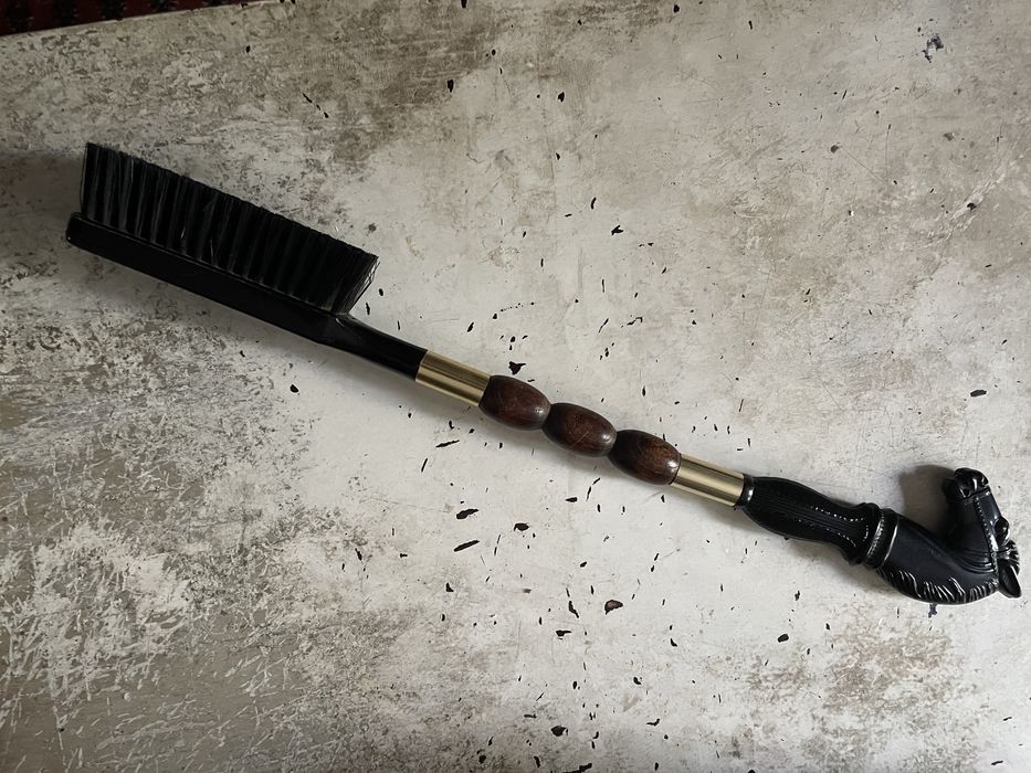 Escova de fatos antiga