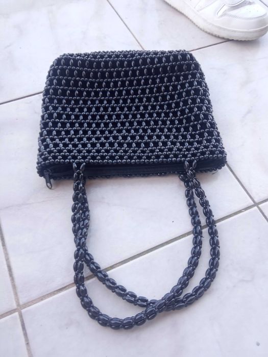 Bolsa preta mão