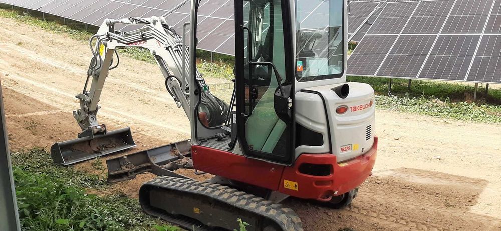 usługi minikoparką , minikoparka Giżycko, koparka, koparko-ładowarka