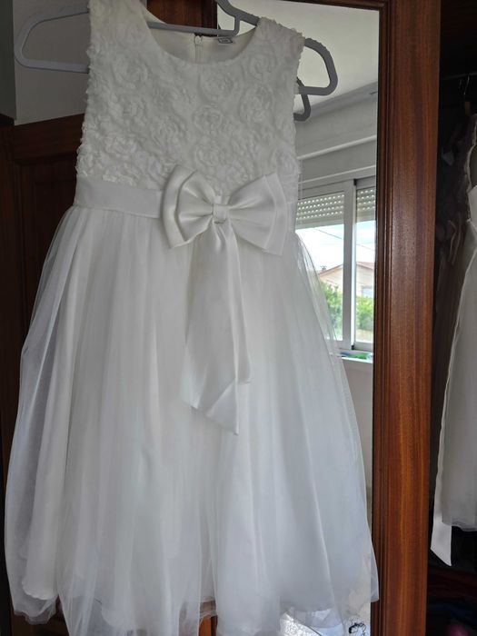 Vestdos como novo de criança de 6 anos