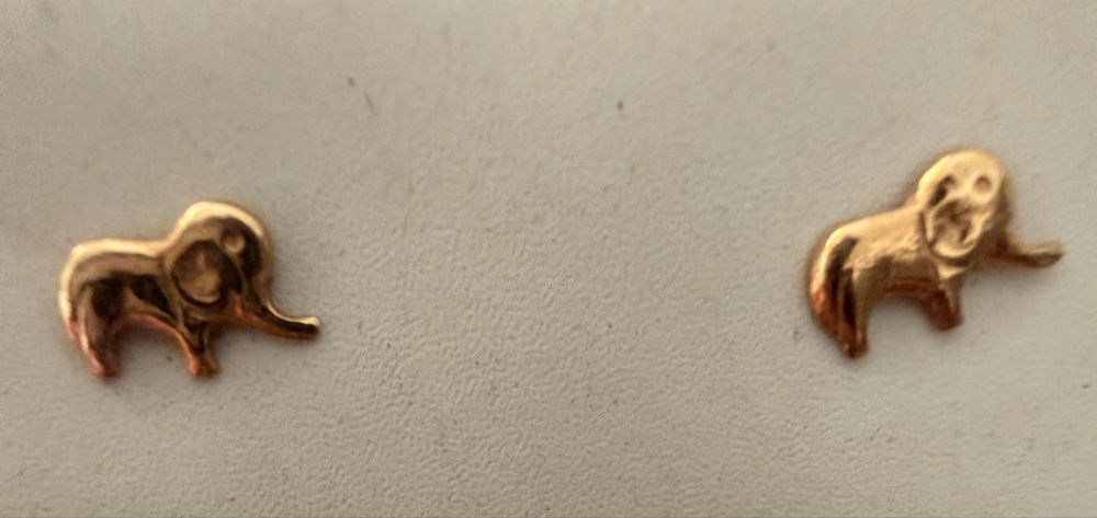 Par de brincos "elefantes" ouro