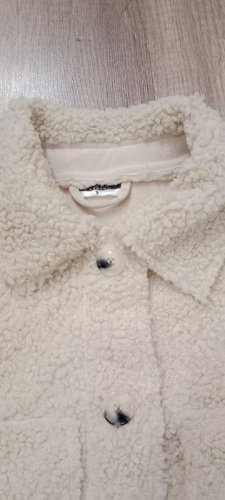 Bluza damska zapinana.
