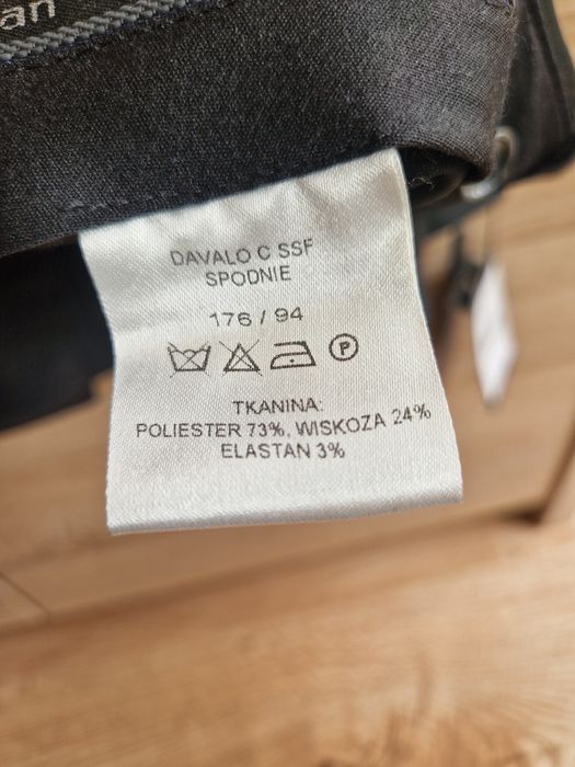Recman Nowe spodnie garniturowe 176/94 młodzieżowe