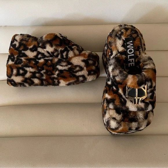 Naked Wolfe platform slides