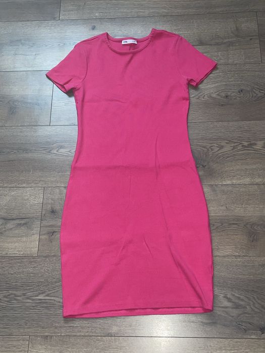 Рожеве плаття з Сінцей