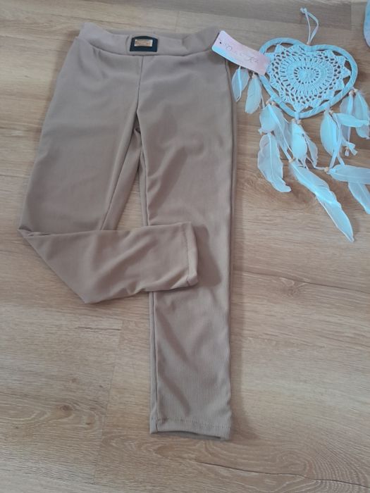 Brązowe prazkowane legginsy leginsy 12 lat 146 152