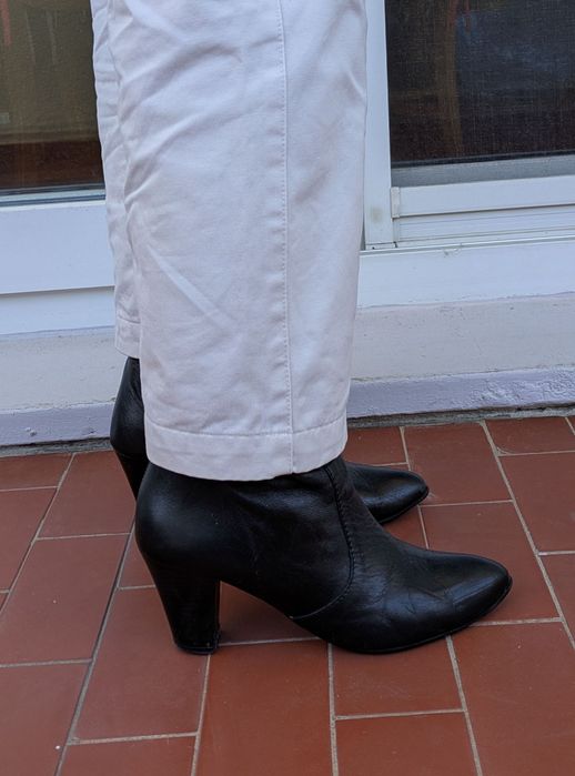 Botas pretas cano alto