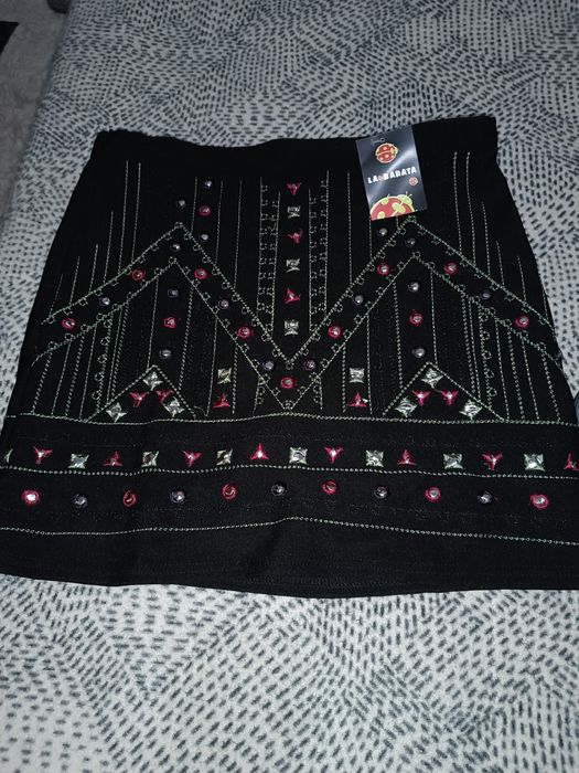 Roupa de Senhora calças, body, casaco, colete e saias