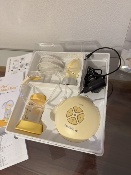 Електричний молоковідсмоктувач MEDELA Swing Flex молокоотсос помпа
