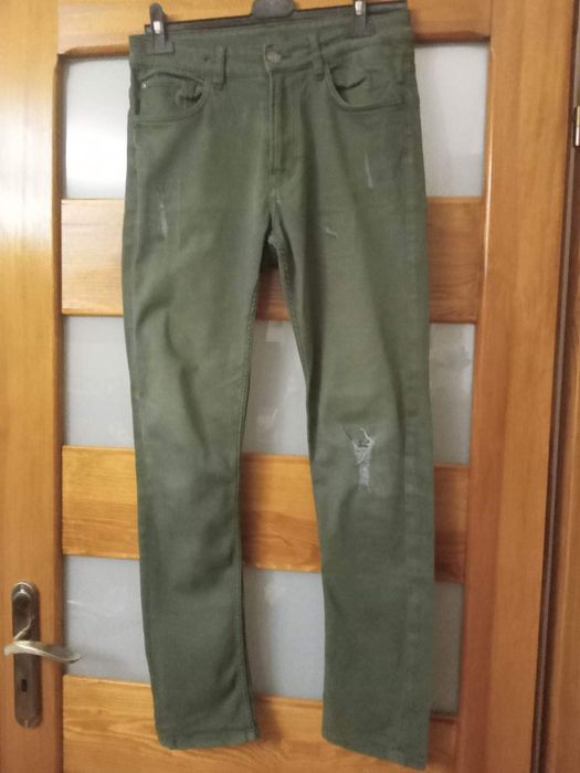 Zielone męskie dżinsy skinny fit rozm. S z przetarciami
