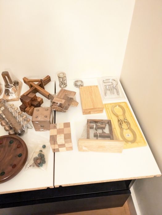 31 Quebra Cabeças em madeira e metal