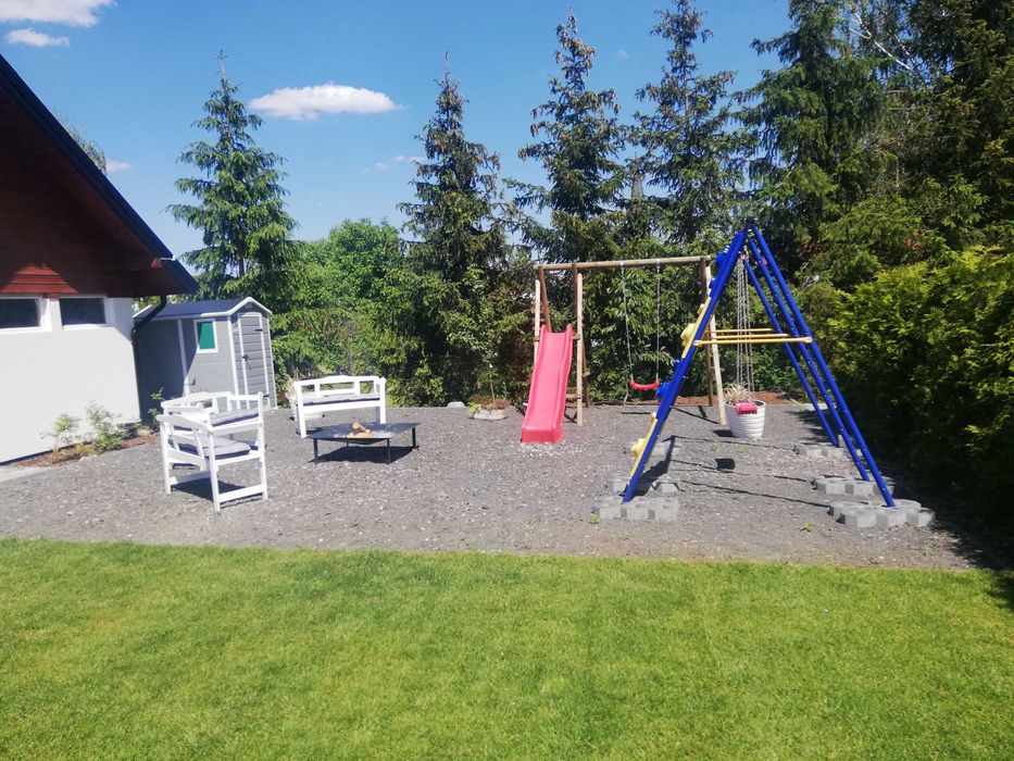 Domek Bielik z jakuzzi  nad jeziorem w Lubniewicach