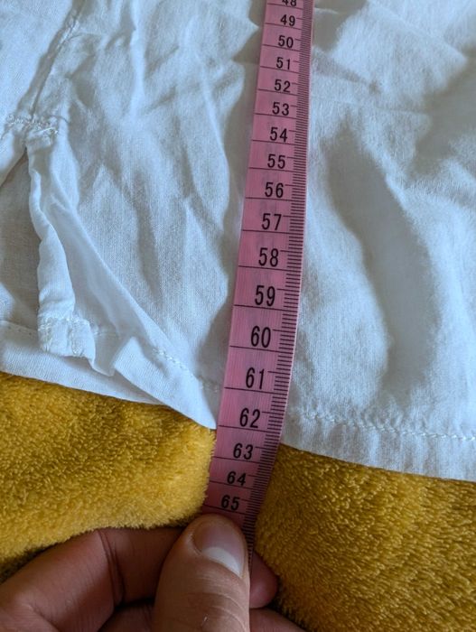 Damska biała koszulka z guziczkami rozmiar S