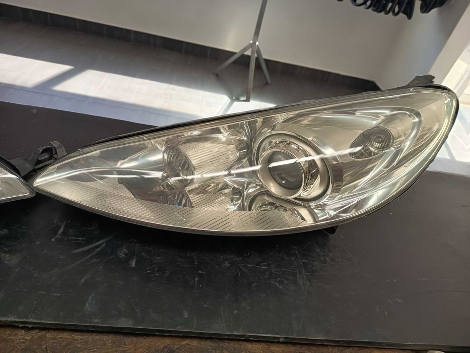 Farois frente Peugeot 407 coupe  xenon ano 2008