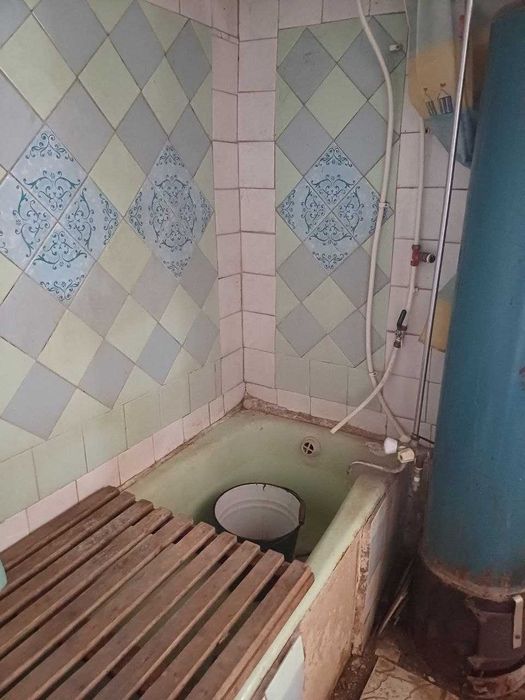 Продам 1/2 будинка в м.Богодухові