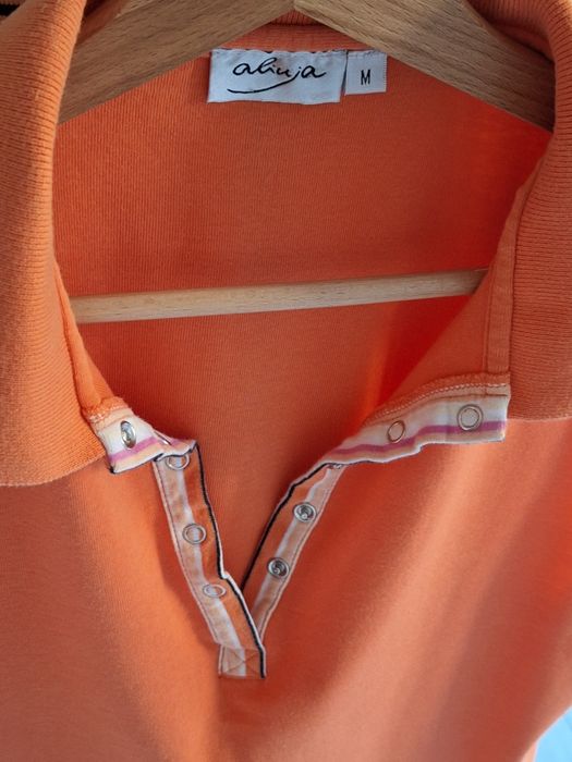 bawełniana pomarańczowa koszulka polo bez rękawków z kołnierzykiem