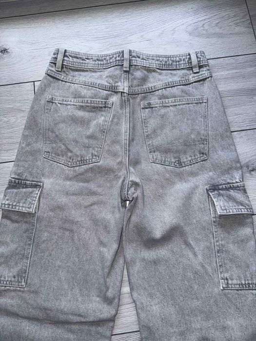 Spodnie jeansowe jeansy damskie jasnoszare Cropp