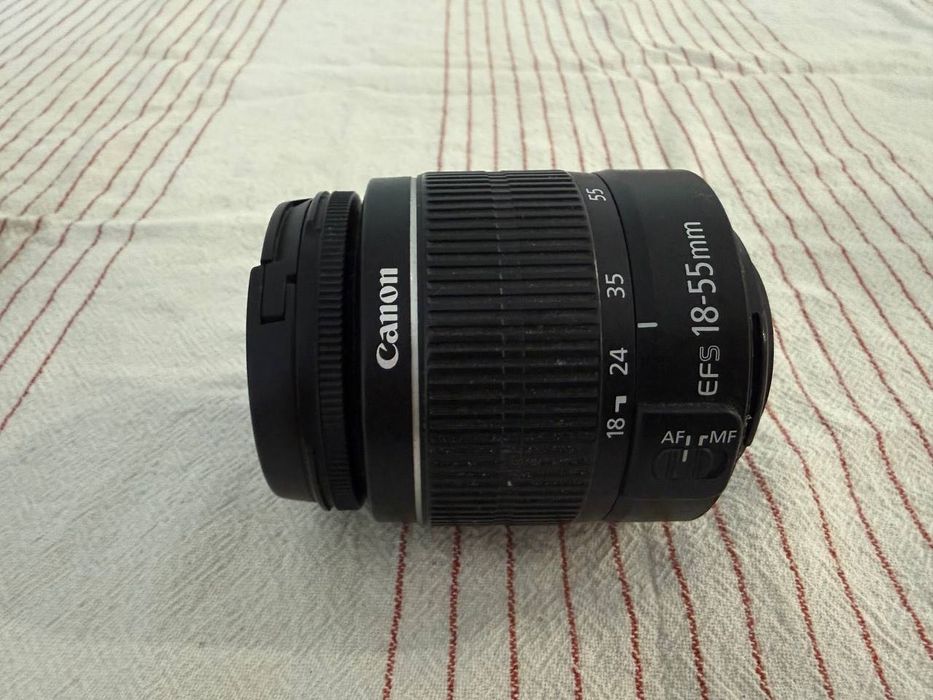 canon 600 D. Com objetiva e bolsa.