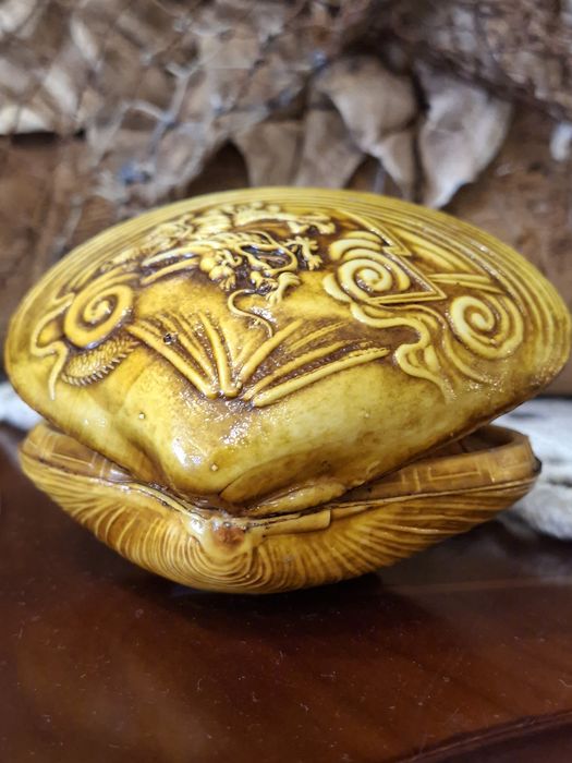 Miniatura antiga de carregador Japonês em celuloide